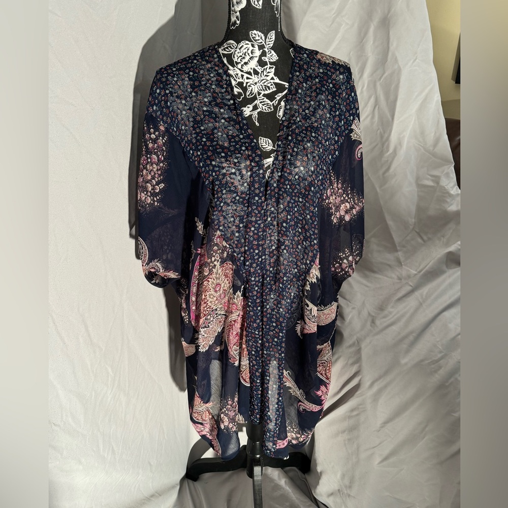 Maurice’s navy kimono with flower design